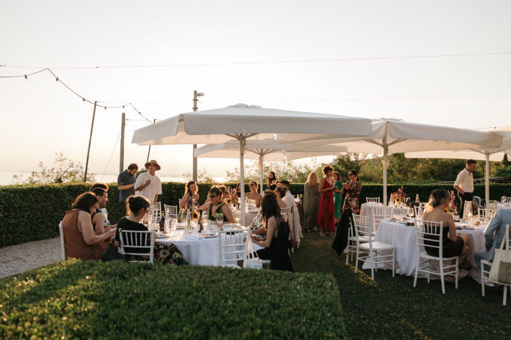 villa bonomo wedding dinner trieste italy sunset outdoor reception romantic light