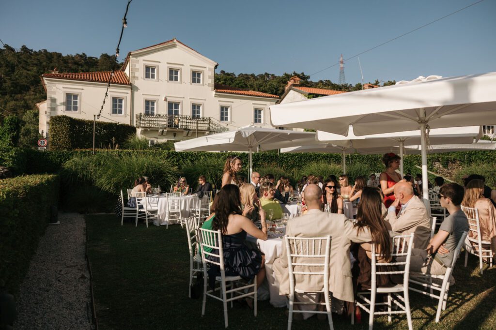 villa bonomo wedding reception trieste italy guests dining outdoor elegant garden