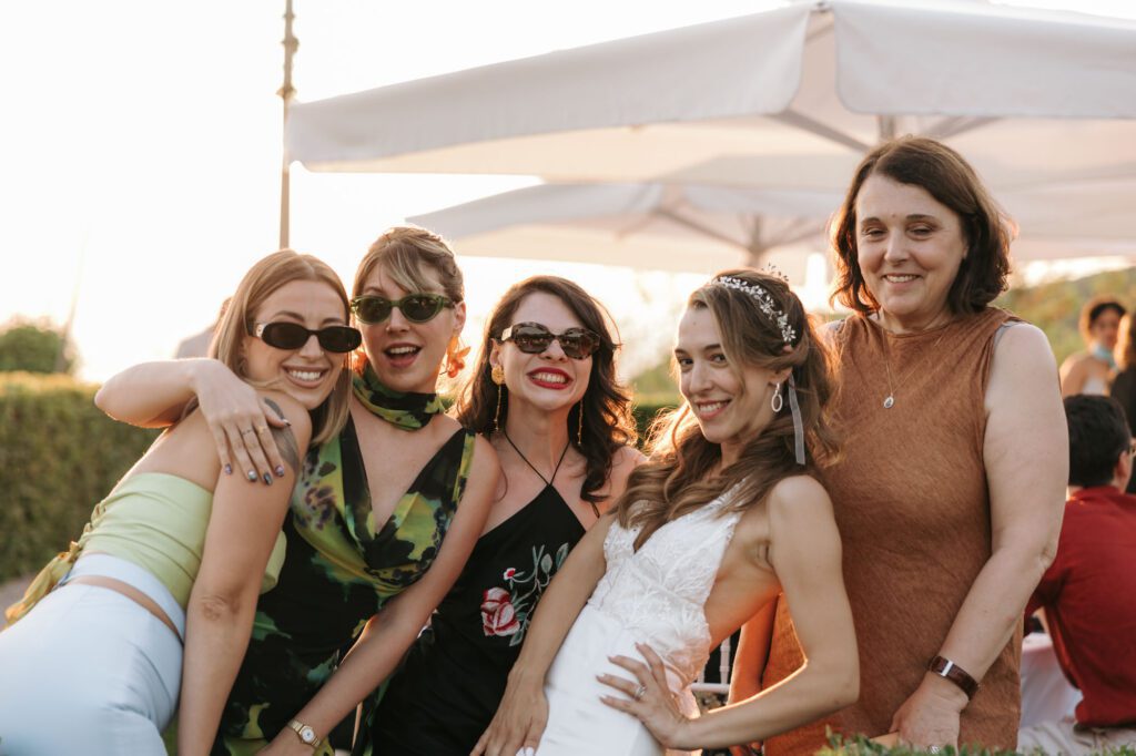 bride with friends villa bonomo wedding trieste italy joyful group moment
