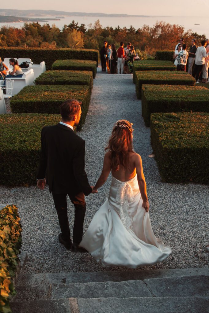 villa bonomo wedding couple walking garden sunset trieste italy cinematic view