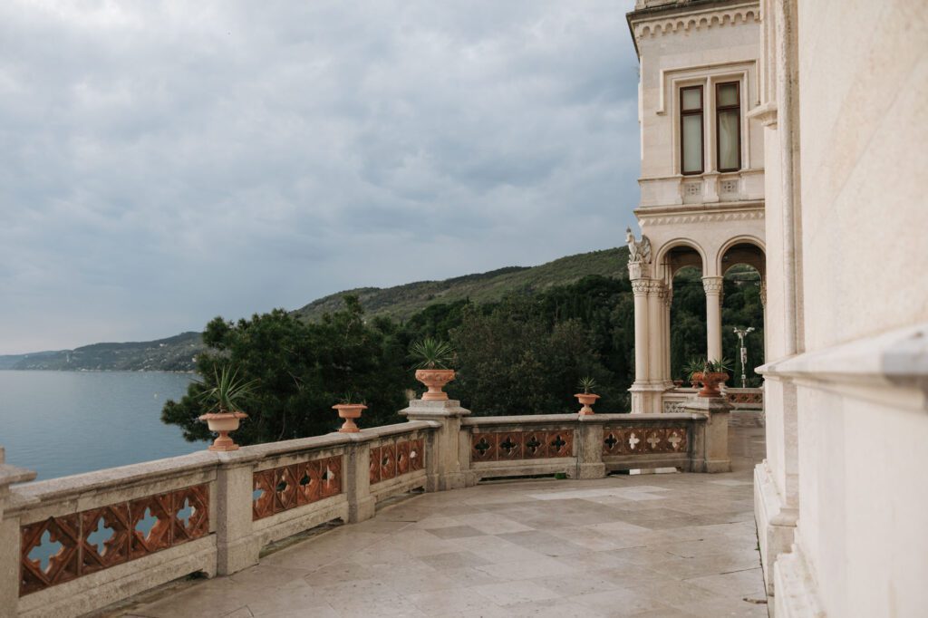 Terrace of Miramare Castle in Trieste, Italy overlooking the Adriatic Sea, a scenic setting for weddings and elopements