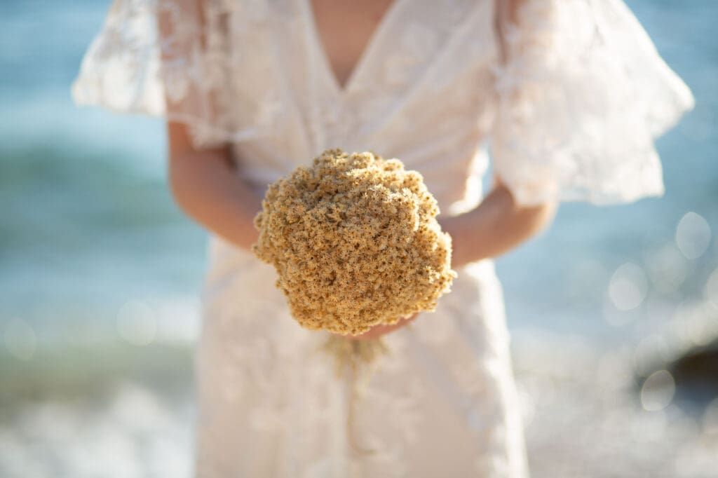Close-up of a dried immortelle bouquet during an intimate Hvar elopement by the sea in Croatia
