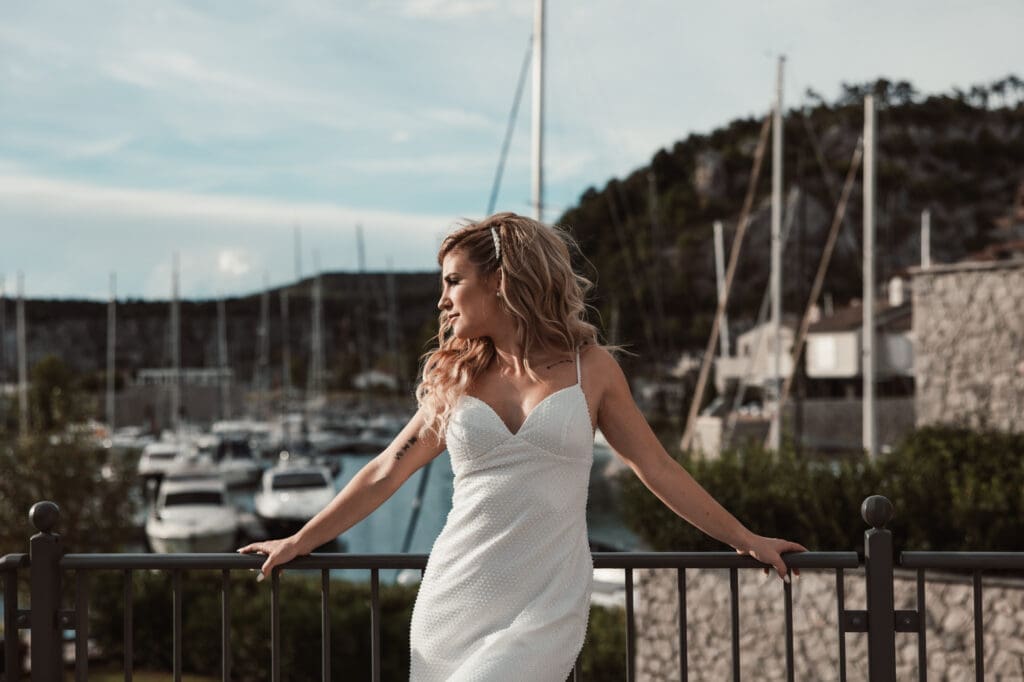 Portrait of Zala during wedding portraits in Portopiccolo overlooking the marina near Sistiana, Italy.