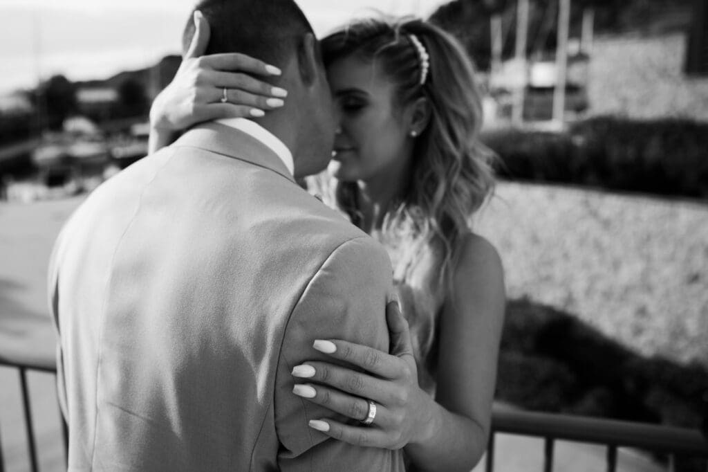 Intimate black and white portrait of Zala and Matej during their wedding portraits in Portopiccolo, Italy.