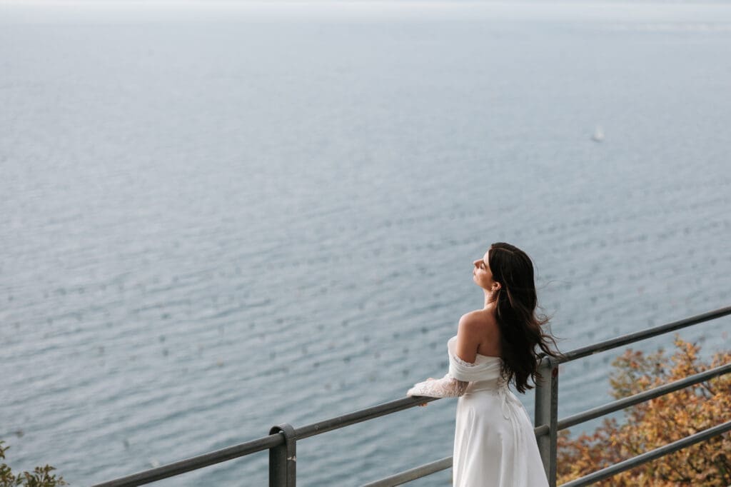 Bride overlooking the Adriatic Sea near Trieste, Italy during a bridal editorial photoshoot