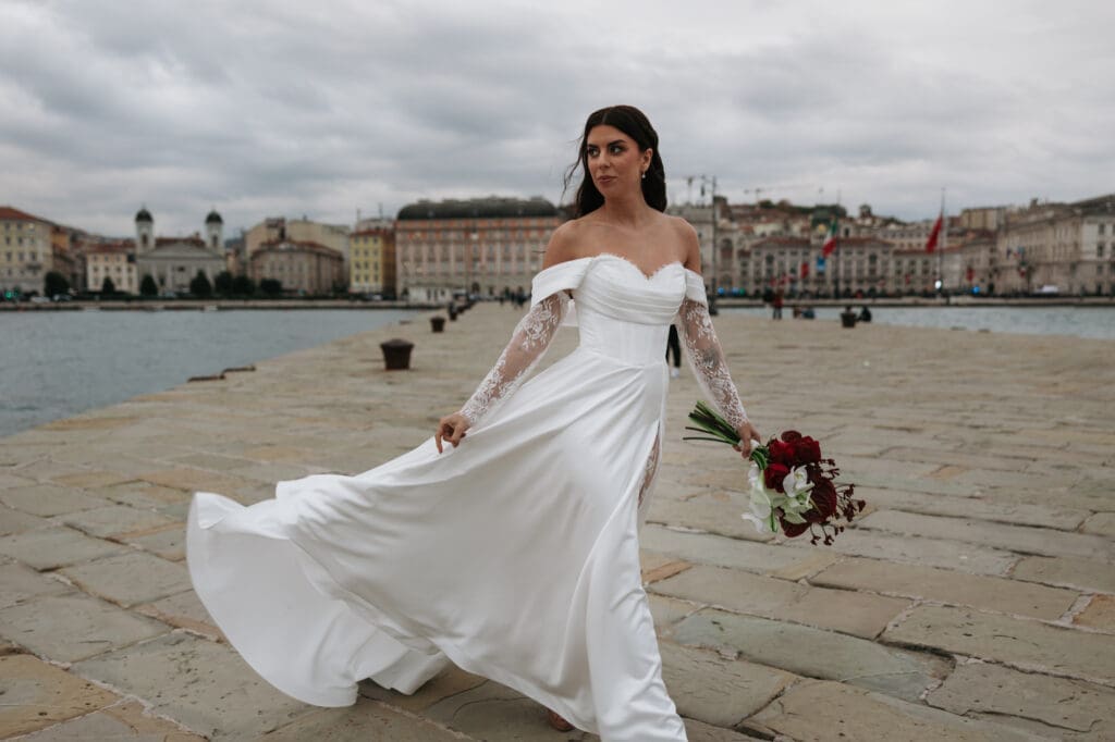Modern bridal editorial on Molo Audace in Trieste, Italy