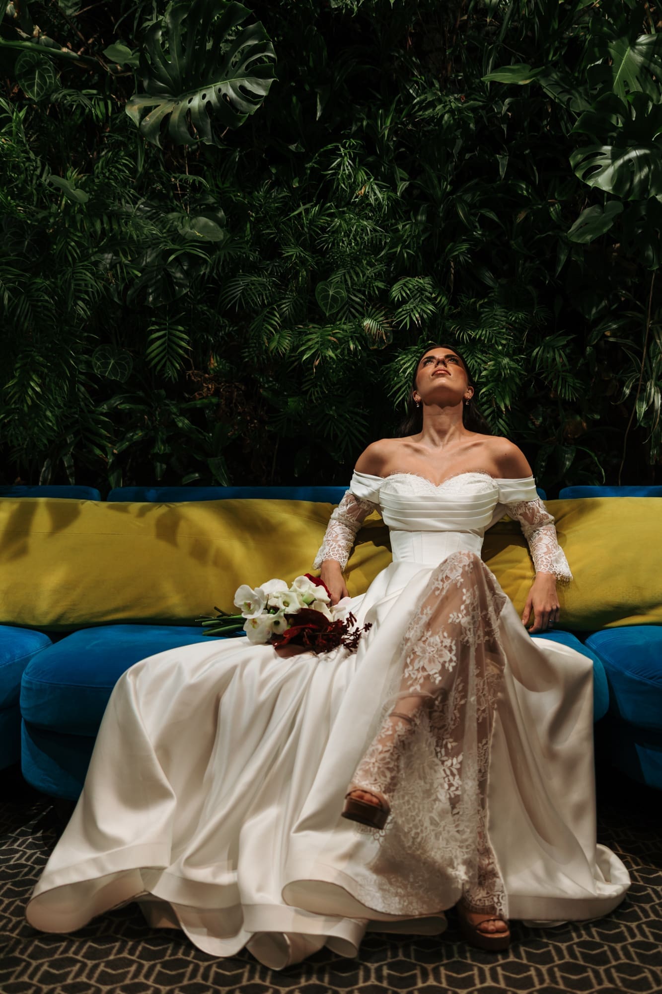 Bride relaxing at The Modernist Hotel on Corso Italia during a modern editorial wedding photoshoot in Trieste, Italy