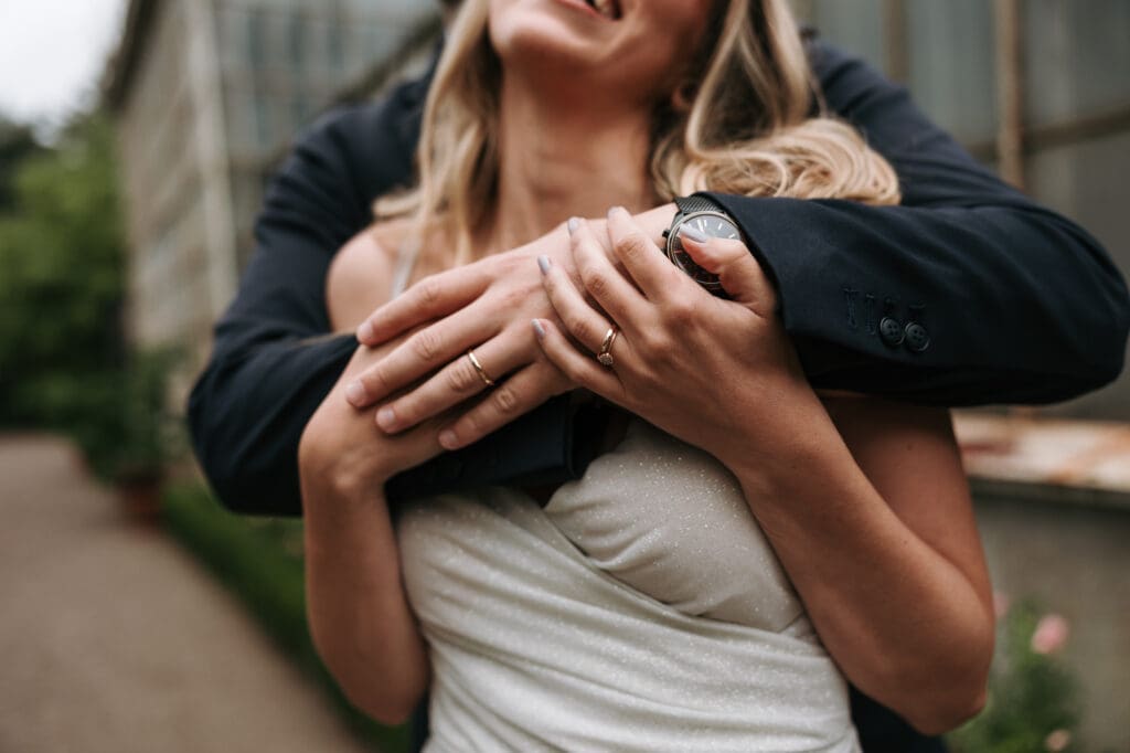 Close-up of the bride and groom embracing during their wedding portraits at Villa Mirasasso in Slovenia.