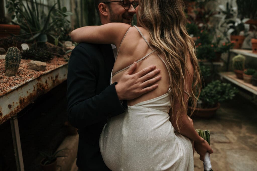 Intimate wedding portrait inside the historic greenhouse at Villa Mirasasso near Sežana, Slovenia.